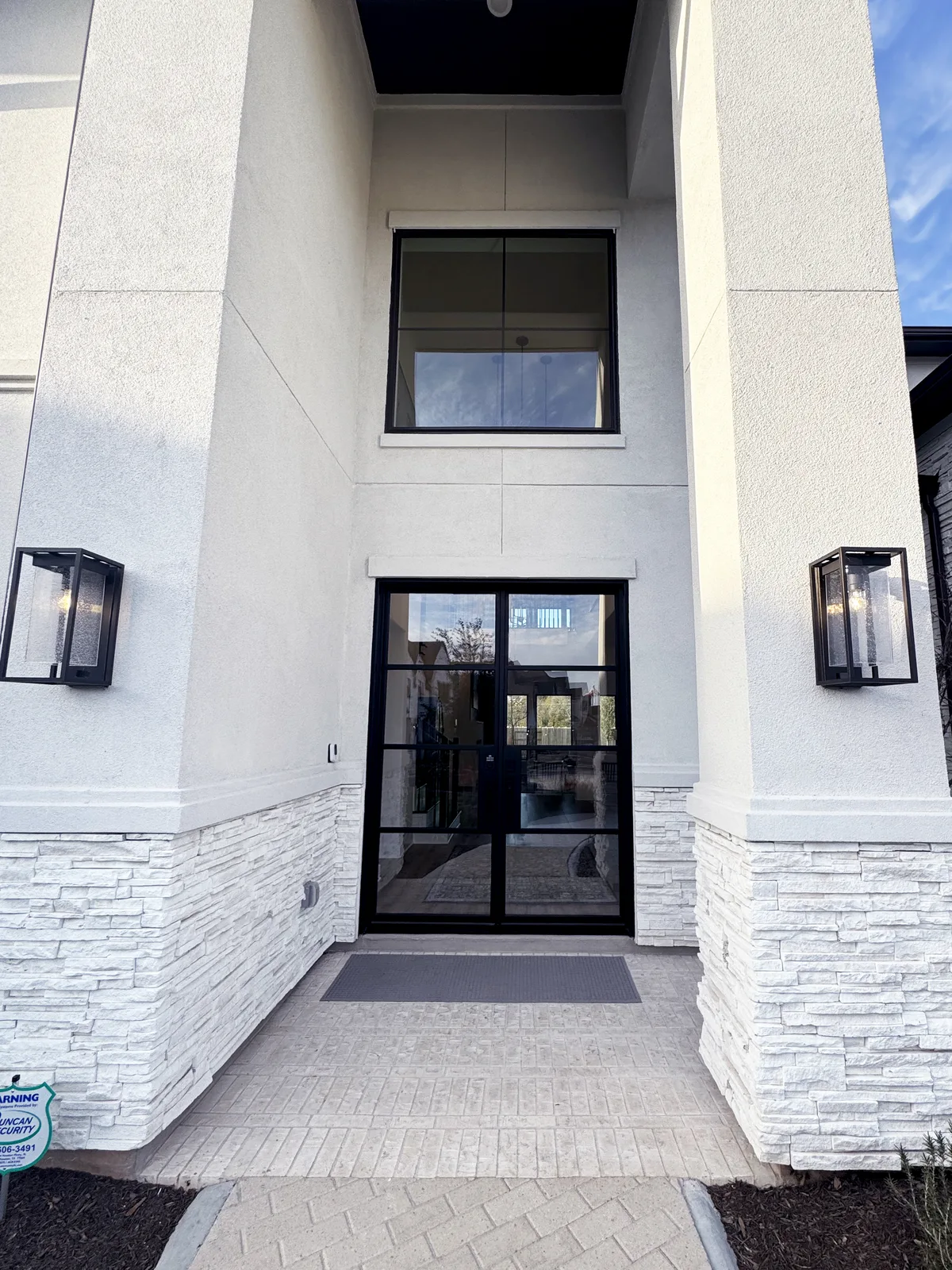 Custom home exterior by Drakon Builders